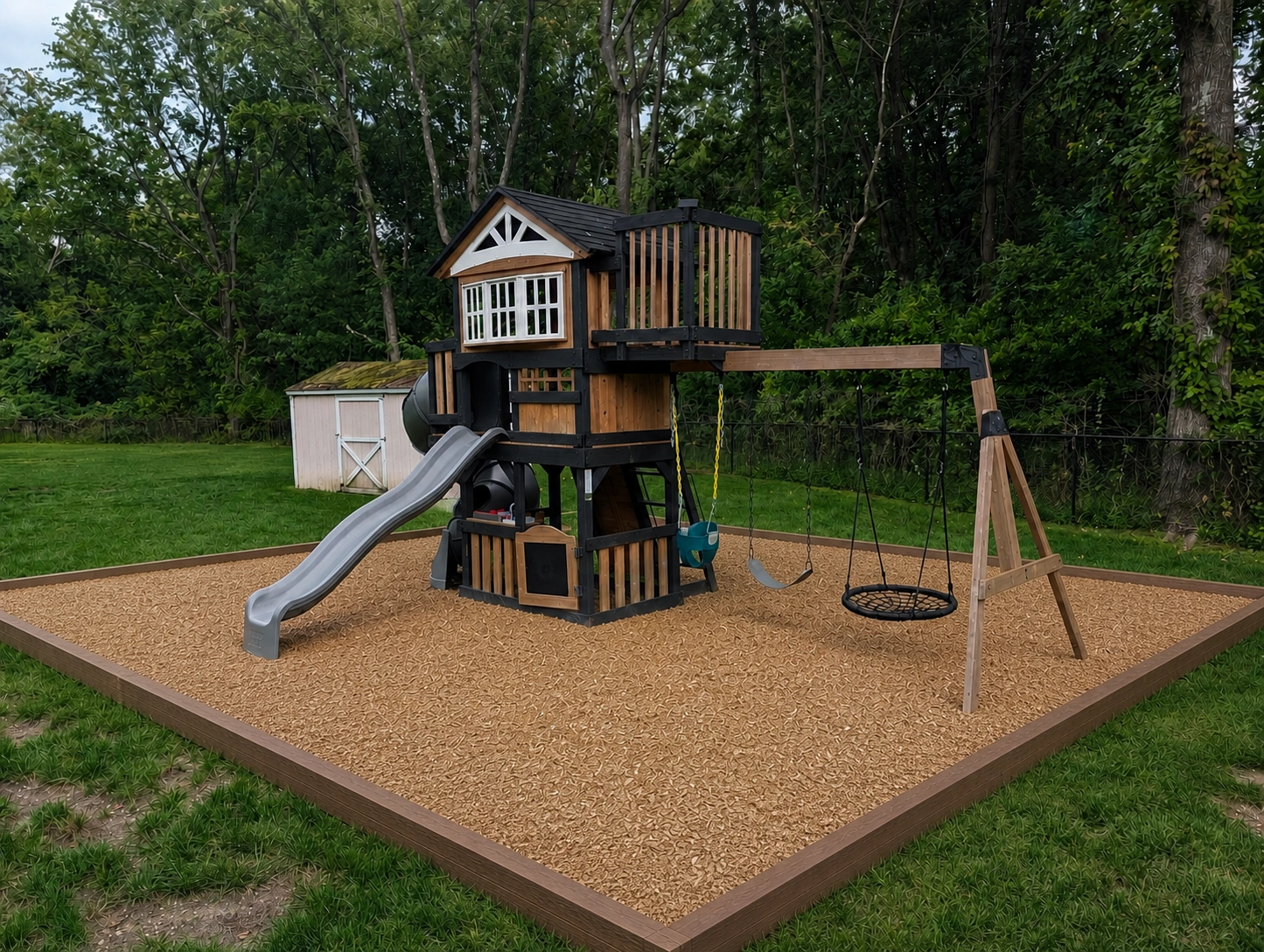 Playground area with a wider square wood-edged playground-mulch area